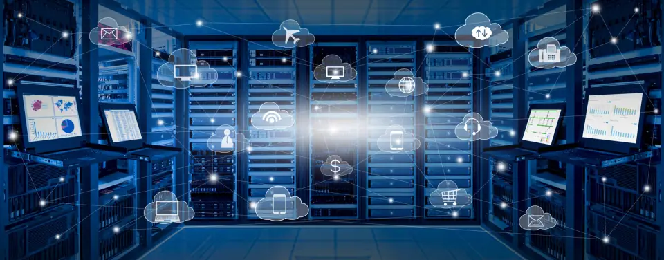 Data center aisle of server racks with rack-mounted consoles, overlaid by a network of glowing cloud icons for desktops, phones, mail and files