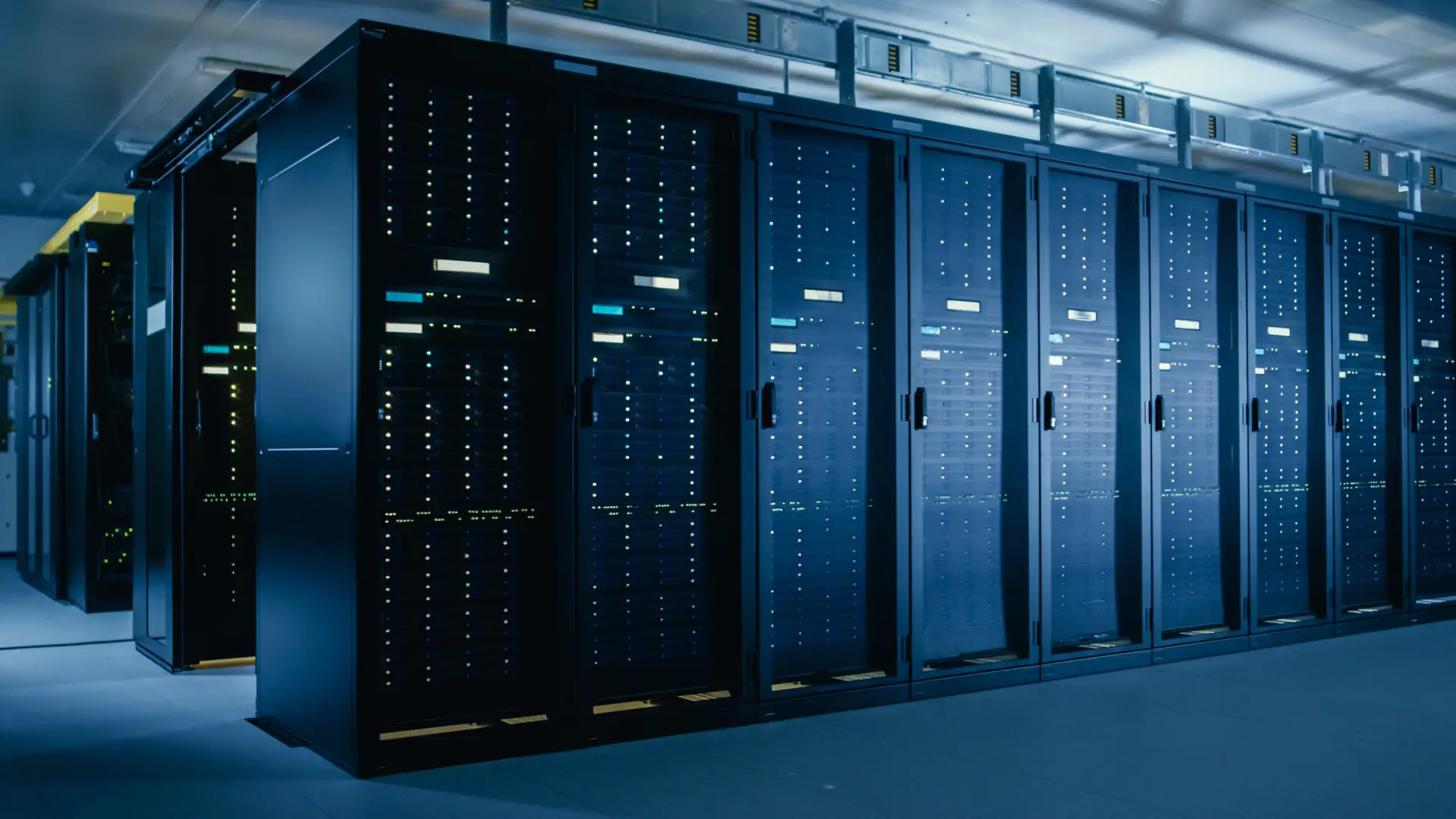 Rows of server racks in a data center